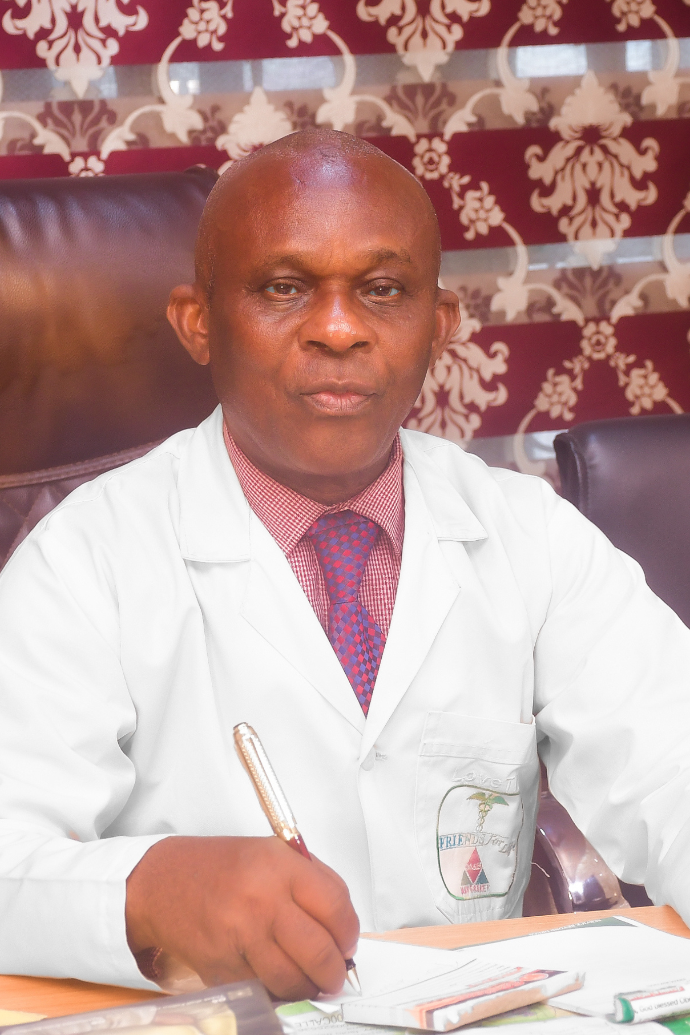 Dr Charles Emuchay